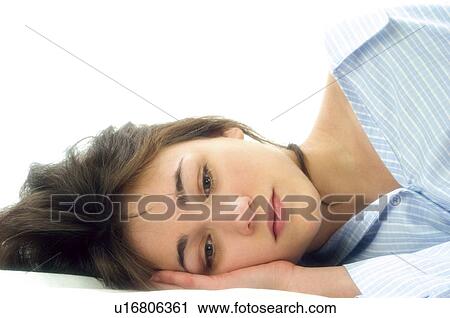 Stock Image - Woman, Beauty, Young, Young woman, Brown hair, Bed, Morning. Fotosearch