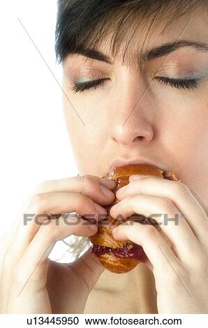 Stock Image - Woman, Breakfast, Having breakfast, Beauty, Young, Young woman, Morning. Fotosearch