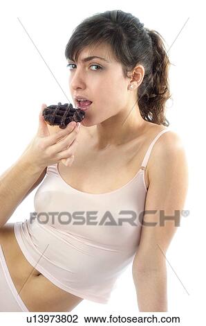 Stock Image - Woman, Breakfast, Having breakfast, Beauty, Young, Young woman, Brown hair. Fotosearch