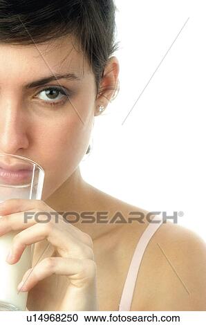 Stock Image - Woman, Breakfast, Having breakfast, Beauty, Young, Young woman, Brown hair. Fotosearch