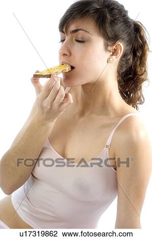 Woman, Breakfast, Having breakfast, Beauty, Young, Young woman, Brown hair View Large Photo Image Stock Image - Woman, Breakfast, Having breakfast, Beauty, Young, Young woman, Brown hair. Fotosearch