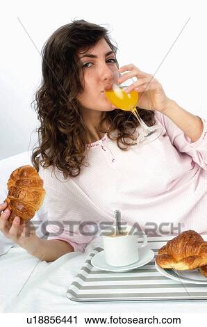 Woman, Breakfast, Having breakfast, Beauty, Young, Young woman, Brown hair View Large Photo Image Stock Image - Woman, Breakfast, Having breakfast, Beauty, Young, Young woman, Brown hair. Fotosearch