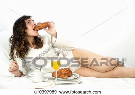 Woman, Breakfast, Having breakfast, Beauty, Young, Young woman, Brown hair View Large Photo Image Stock Photo - Woman, Breakfast, Having breakfast, Beauty, Young, Young woman, Brown hair. Fotosearch
