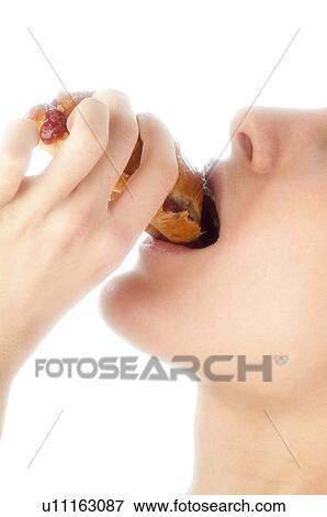 Stock Photo - Woman, Breakfast, Having breakfast, Beauty, Young, Young woman, Morning. Fotosearch