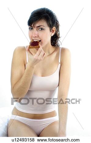 Woman, Breakfast, Having breakfast, Beauty, Young, Young woman, Brown hair View Large Photo Image Stock Photo - Woman, Breakfast, Having breakfast, Beauty, Young, Young woman, Brown hair. Fotosearch