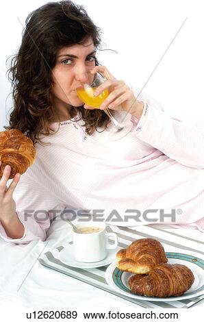Woman, Breakfast, Having breakfast, Beauty, Young, Young woman, Brown hair View Large Photo Image Stock Photo - Woman, Breakfast, Having breakfast, Beauty, Young, Young woman, Brown hair. Fotosearch