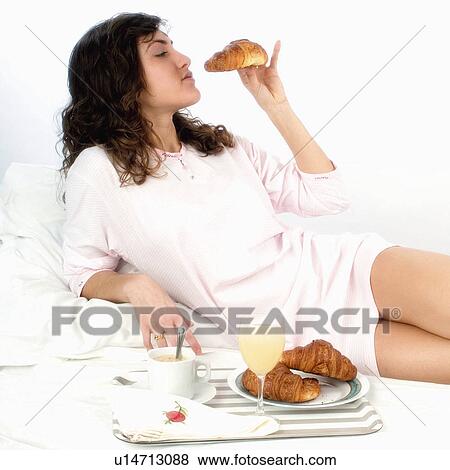 Woman, Breakfast, Having breakfast, Beauty, Young, Young woman, Brown hair View Large Photo Image Stock Photo - Woman, Breakfast, Having breakfast, Beauty, Young, Young woman, Brown hair. Fotosearch