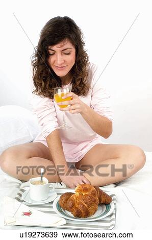 Woman, Breakfast, Having breakfast, Beauty, Young, Young woman, Brown hair View Large Photo Image Stock Photo - Woman, Breakfast, Having breakfast, Beauty, Young, Young woman, Brown hair. Fotosearch