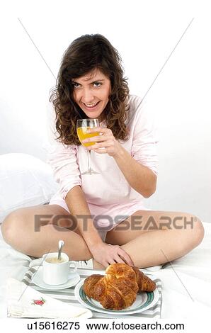 Woman, Breakfast, Having breakfast, Beauty, Young, Young woman, Brown hair View Large Photo Image Stock Photography - Woman, Breakfast, Having breakfast, Beauty, Young, Young woman, Brown hair. Fotosearch
