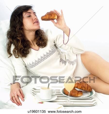 Woman, Breakfast, Having breakfast, Beauty, Young, Young woman, Brown hair View Large Photo Image Stock Photography - Woman, Breakfast, Having breakfast, Beauty, Young, Young woman, Brown hair. Fotosearch