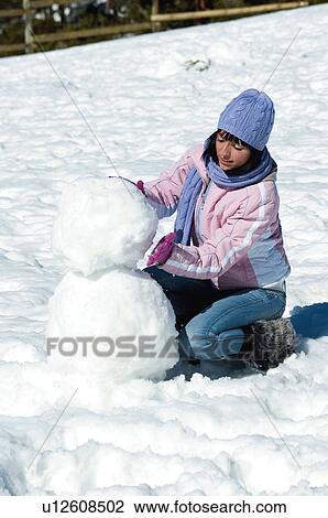 Stock Image - Woman, Young, Young woman, Beautiful, Winter, Clothes, Winter clothes. Fotosearch