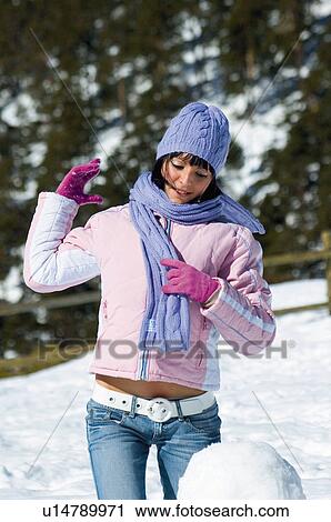Stock Image - Woman, Young, Young woman, Beautiful, Winter, Clothes, Winter clothes. Fotosearch