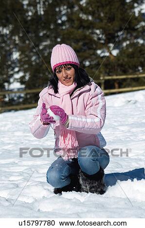 Stock Image - Woman, Young, Young woman, Beautiful, Winter, Clothes, Winter clothes. Fotosearch