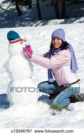 Stock Photo - Woman, Young, Young woman, Beautiful, Winter, Clothes, Winter clothes. Fotosearch
