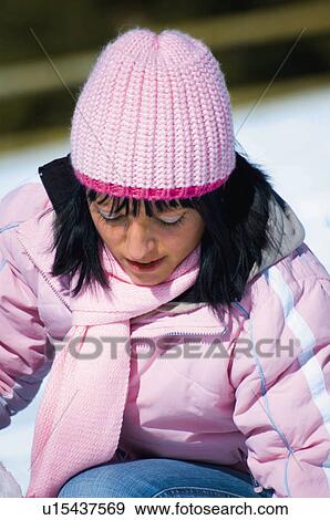 Stock Photo - Woman, Young, Young woman, Beautiful, Winter, Clothes, Winter clothes. Fotosearch
