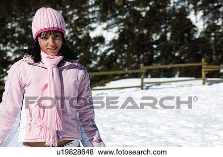 Stock Photo - Woman, Young, Young woman, Beautiful, Winter, Clothes, Winter clothes. Fotosearch