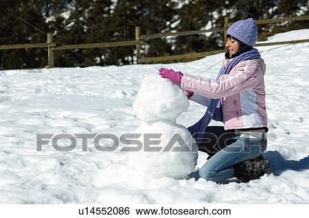 Woman, Young, Young woman, Beautiful, Winter, Clothes, Winter clothes View Large Photo Image Stock Photograph - Woman, Young, Young woman, Beautiful, Winter, Clothes, Winter clothes. Fotosearch
