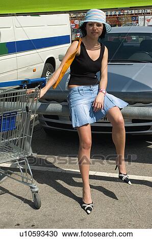 Woman, Young, Young woman, Beautiful, Consumer, Shop, Shopping View Large Photo Image Stock Image - Woman, Young, Young woman, Beautiful, Consumer, Shop, Shopping. Fotosearch