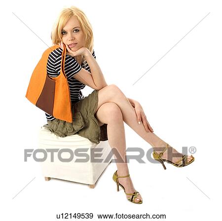 Stock Photo - Woman, Beauty, Blond, Blonde, Blond hair, Long hair, Elegance. Fotosearch