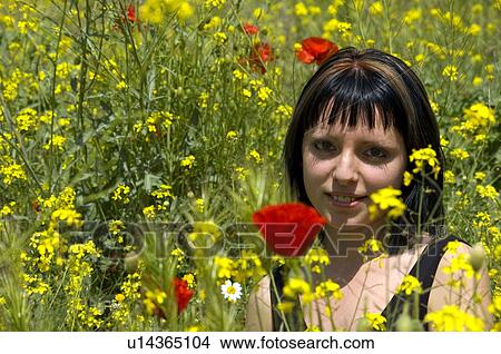 Woman, Young, Nature, Country, Flowers, Country of flowers, Yellow View Large Photo Image Picture - Woman, Young, Nature, Country, Flowers, Country of flowers, Yellow. Fotosearch