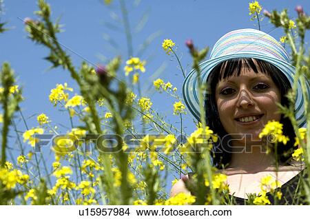 Woman, Young, Nature, Country, Flowers, Country of flowers, Yellow View Large Photo Image Picture - Woman, Young, Nature, Country, Flowers, Country of flowers, Yellow. Fotosearch