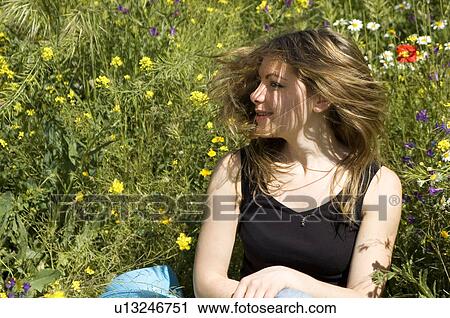 Woman, Young, Nature, Country, Flowers, Country of flowers, Yellow View Large Photo Image Stock Image - Woman, Young, Nature, Country, Flowers, Country of flowers, Yellow. Fotosearch