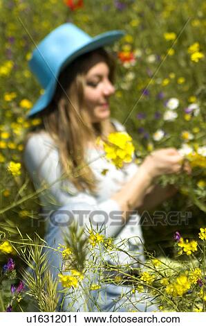 Woman, Young, Nature, Country, Flowers, Country of flowers, Yellow View Large Photo Image Stock Image - Woman, Young, Nature, Country, Flowers, Country of flowers, Yellow. Fotosearch