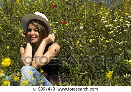 Woman, Young, Nature, Country, Flowers, Country of flowers, Yellow View Large Photo Image Stock Photo - Woman, Young, Nature, Country, Flowers, Country of flowers, Yellow. Fotosearch