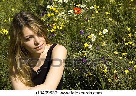 Woman, Young, Nature, Country, Flowers, Country of flowers, Yellow View Large Photo Image Stock Photo - Woman, Young, Nature, Country, Flowers, Country of flowers, Yellow. Fotosearch