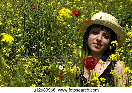 Woman, Young, Nature, Country, Flowers, Country of flowers, Yellow View Large Photo Image Stock Photograph - Woman, Young, Nature, Country, Flowers, Country of flowers, Yellow. Fotosearch