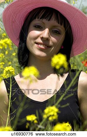 Woman, Young, Nature, Country, Flowers, Country of flowers, Yellow View Large Photo Image Stock Photograph - Woman, Young, Nature, Country, Flowers, Country of flowers, Yellow. Fotosearch