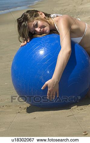 Stock Photo - Woman, Blond, Blonde, Blond hair, Beauty, Beach, Summer. Fotosearch
