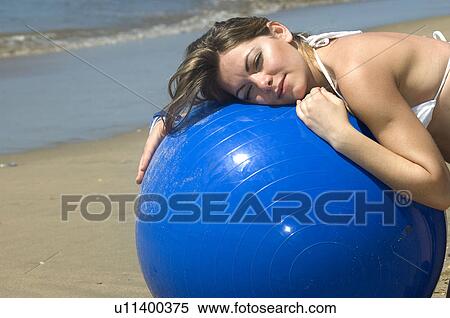 Stock Photography - Woman, Blond, Blonde, Blond hair, Beauty, Beach, Summer. Fotosearch