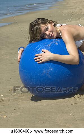 Stock Photography - Woman, Blond, Blonde, Blond hair, Beauty, Beach, Summer. Fotosearch