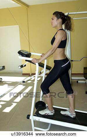 Woman, Fitness, Gym, Gymnastics, Brown hair, Pigtail, Ponytail View Large Photo Image Picture - Woman, Fitness, Gym, Gymnastics, Brown hair, Pigtail, Ponytail. Fotosearch