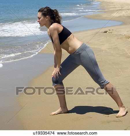 Picture - Woman, Fitness, Gymnastics, Brown hair, Pigtail, Ponytail, Long hair. Fotosearch