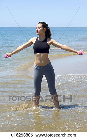 Woman, Fitness, Gymnastics, Brown hair, Pigtail, Ponytail, Long hair View Large Photo Image Stock Photography - Woman, Fitness, Gymnastics, Brown hair, Pigtail, Ponytail, Long hair. Fotosearch