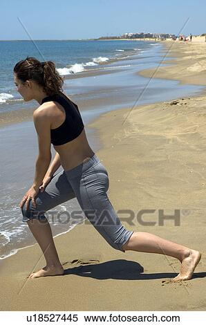 Stock Photography - Woman, Fitness, Gymnastics, Brown hair, Pigtail, Ponytail, Long hair. Fotosearch