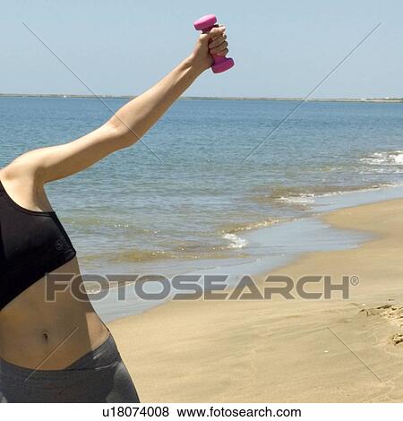 Woman, Fitness, Gymnastics, Top, Sport wear, Sport clothes, Part of the body View Large Photo Image Stock Photo - Woman, Fitness, Gymnastics, Top, Sport wear, Sport clothes, Part of the body. Fotosearch