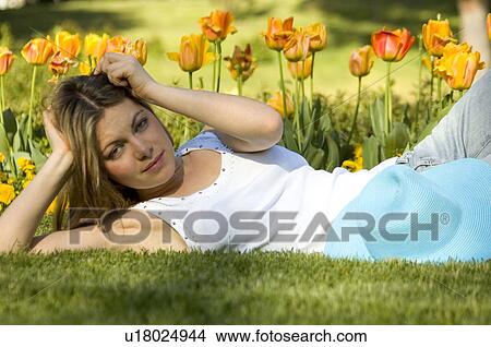 Picture - Woman, Young, Nature, Country, Flowers, Beauty, Blond. Fotosearch