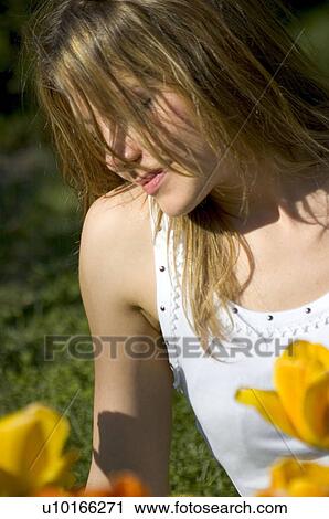 Stock Image - Woman, Young, Nature, Country, Flowers, Beauty, Blond. Fotosearch