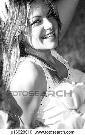 Woman, Young, Nature, Country, Flowers, Beauty, Long hair View Large Photo Image Stock Image - Woman, Young, Nature, Country, Flowers, Beauty, Long hair. Fotosearch