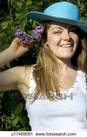 Stock Image - Woman, Young, Nature, Country, Flowers, Beauty, Blond. Fotosearch