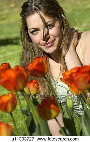 Stock Photo - Woman, Young, Nature, Country, Flowers, Beauty, Blond. Fotosearch