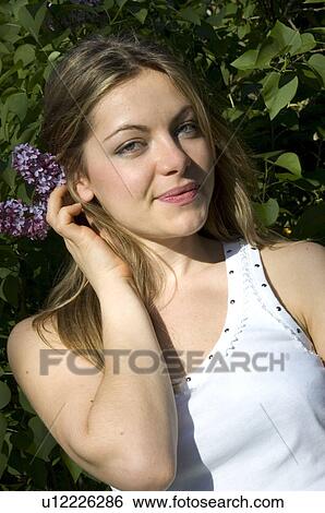 Stock Photograph - Woman, Young, Nature, Country, Flowers, Beauty, Blond. Fotosearch