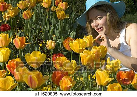 Stock Photography - Woman, Young, Nature, Country, Flowers, Beauty, Blond. Fotosearch