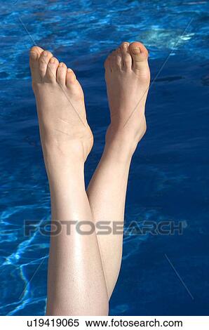 Stock Photography - Woman, Beauty, Young, Swimming Pool, Water, Legs, Foot. Fotosearch