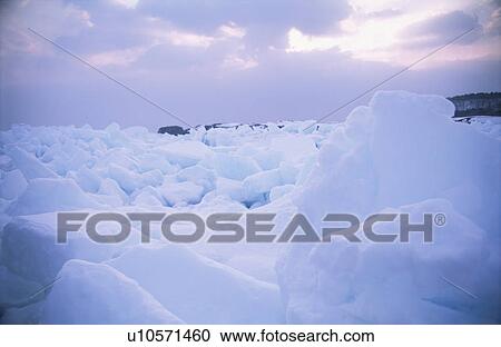 Stock Image - Drift Ice And The Morning Sun. Fotosearch
