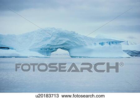 Stock Image - Iceberg With Arch. Fotosearch