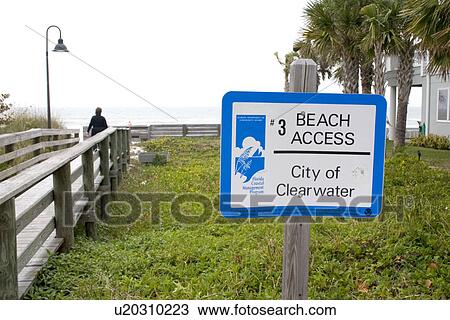 Stock Image - Walkway to Gulf beach. Fotosearch